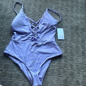 NWT Dippin Daisy’s one piece swimsuit.